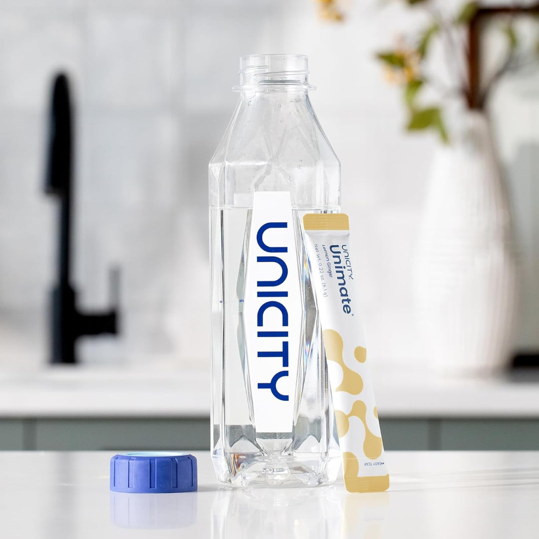 Unicity water bottle with cap on a kitchen counter