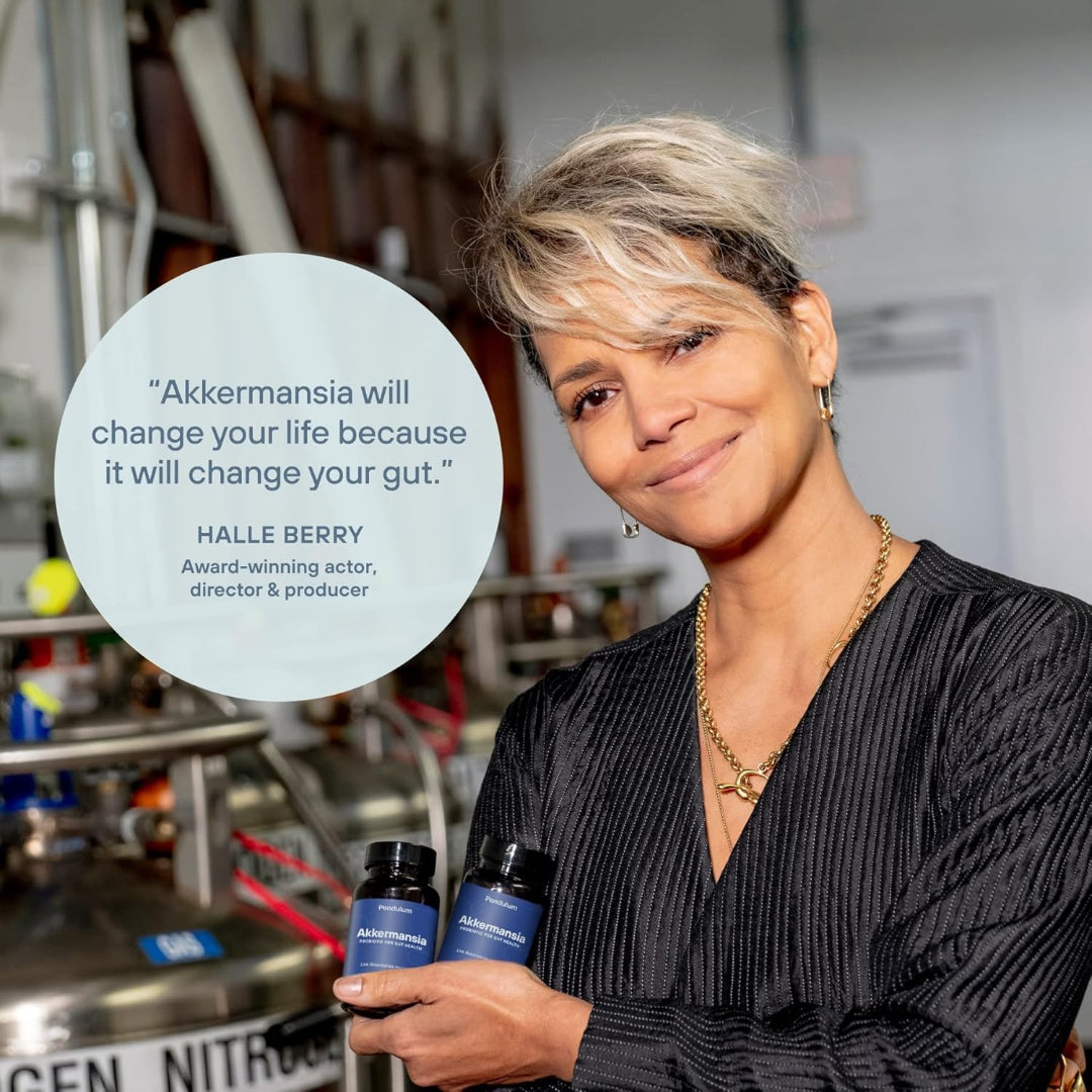 Woman holding bottles with a quote from Halle Berry about Akkermansia