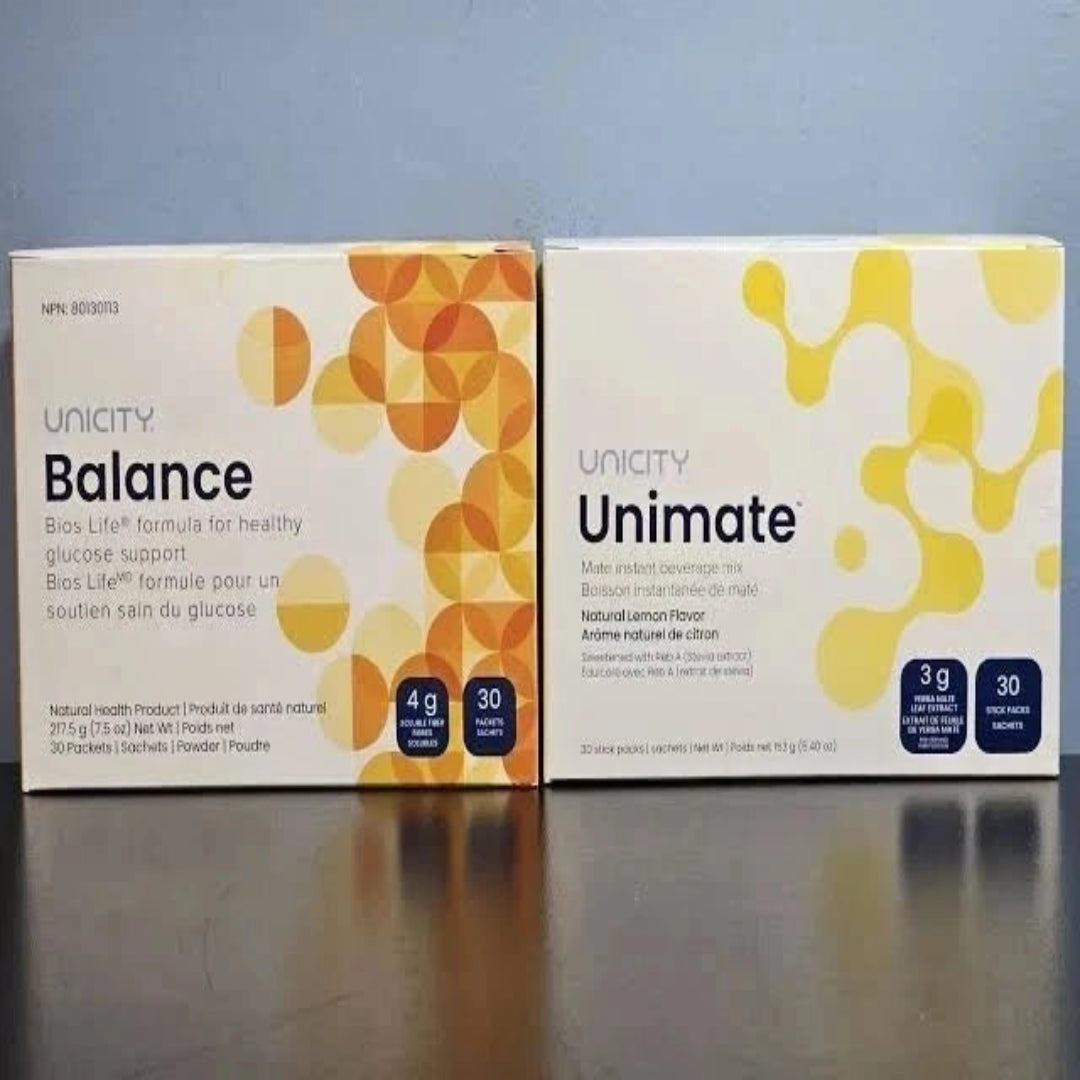 Two boxes of Unityity products, 'Balance' and 'Unimate', on a reflective surface with a blue background.